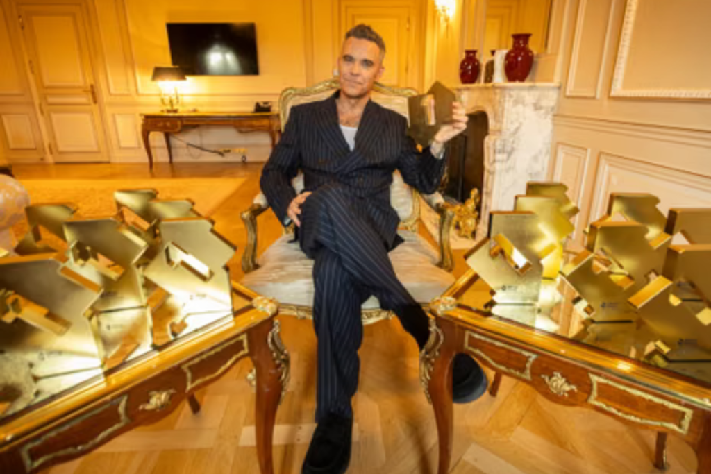 Robbie-Williams-breaks-The-Beatles-chart-record-The-Britpop-album-triumph-By-Imperium-Times.-www.imperiutimes.com_.-@imperiumtimesofficial