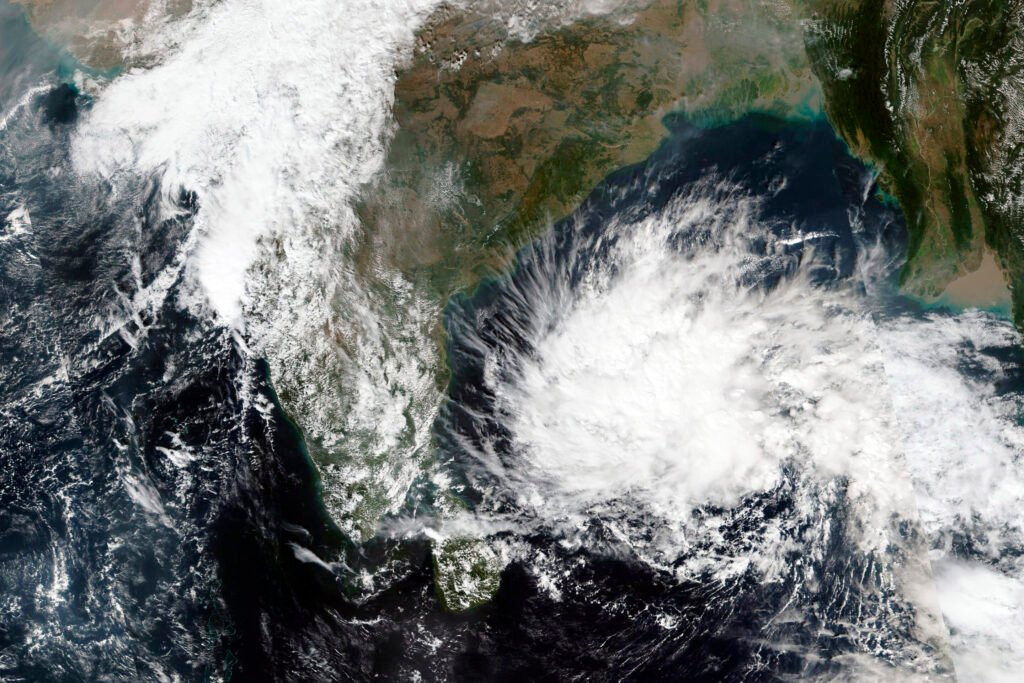 Weather map tracking Cyclone Arnab's projected landfall path" / "Windy.com forecast model showing Cyclone Arnab nearing Visakhapatnam-Gopalpur coastline, Imperiumtimes.com